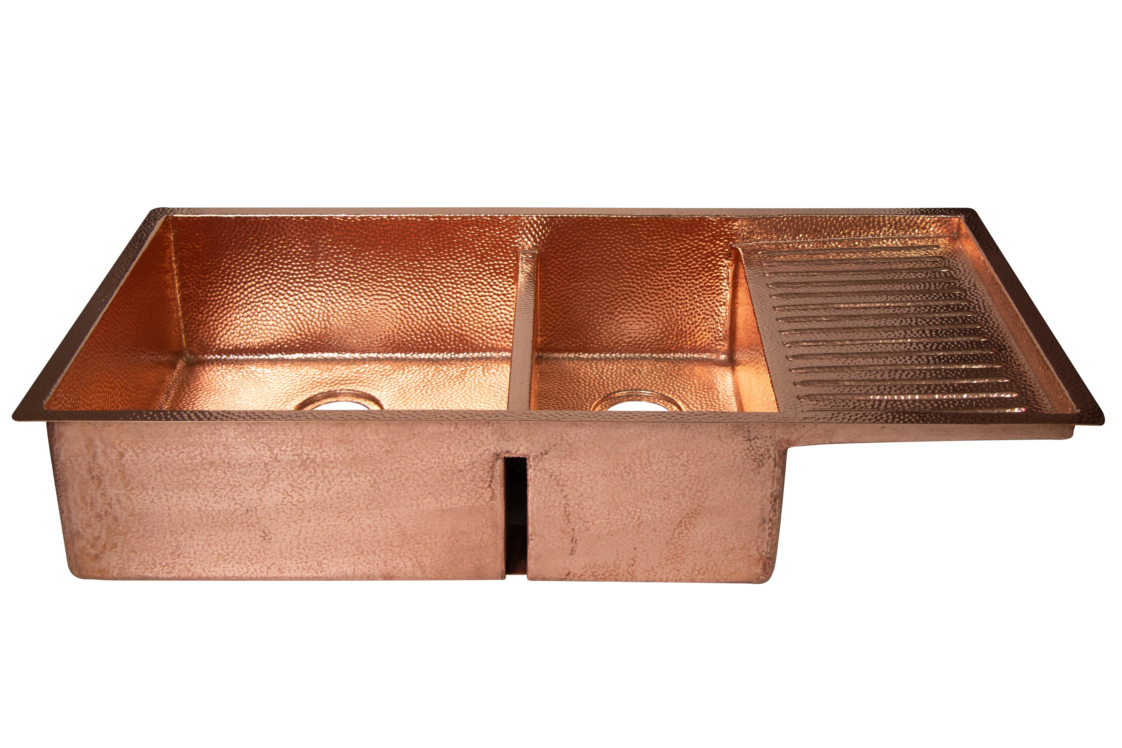 Copper kitchen sink with a textured finish on a white background